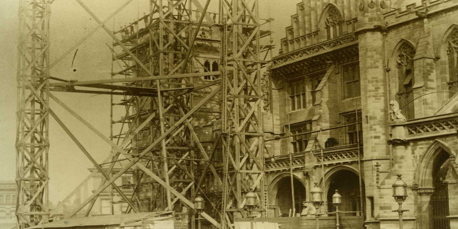 Scaffolding around the new clock tower in the middle of its construction.