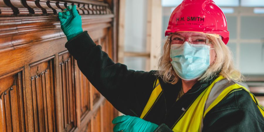 A volunteer working on the restoration of Rochdale Town Hall.